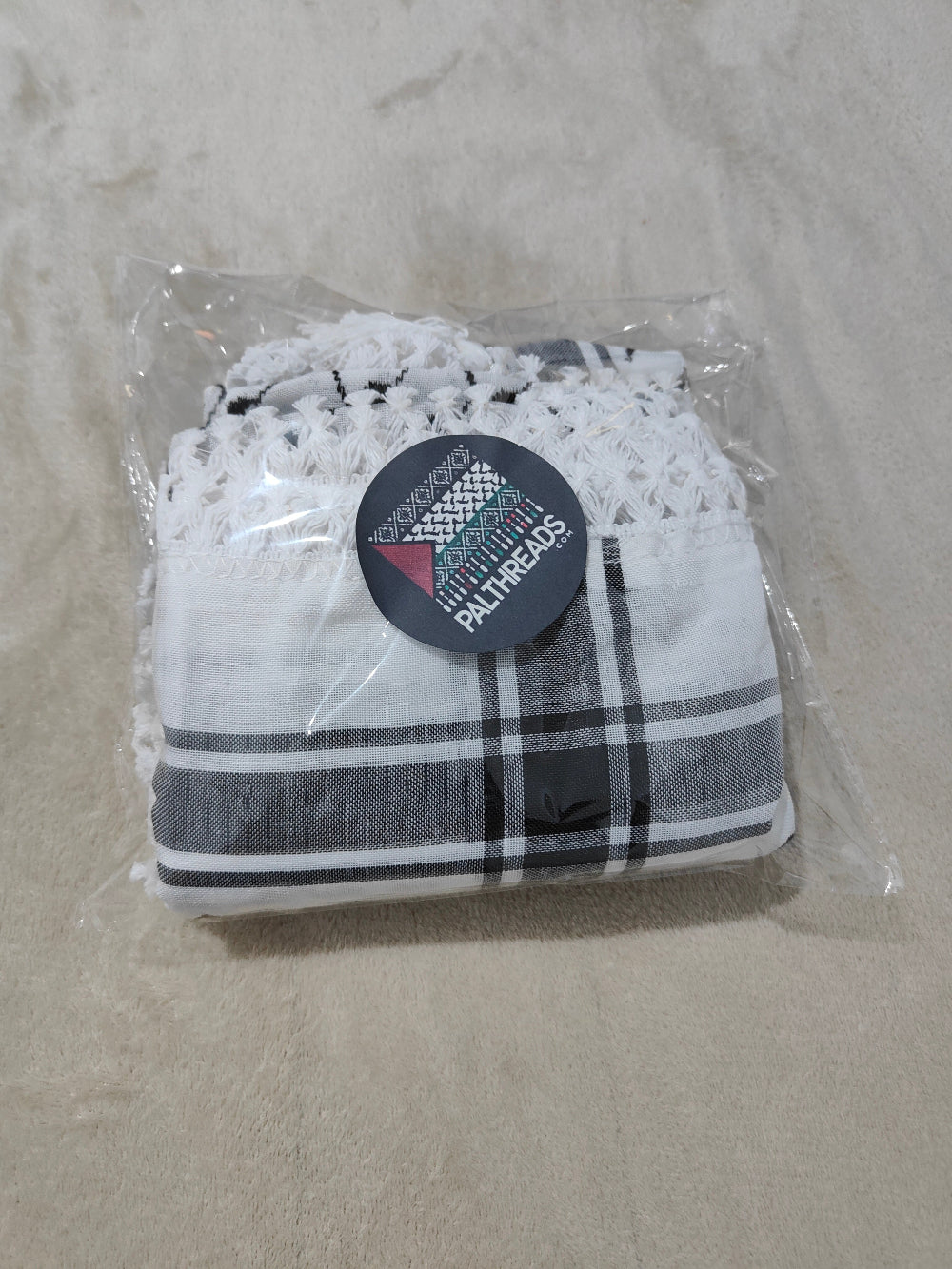packed Keffiyeh with Original Palthreads.com label